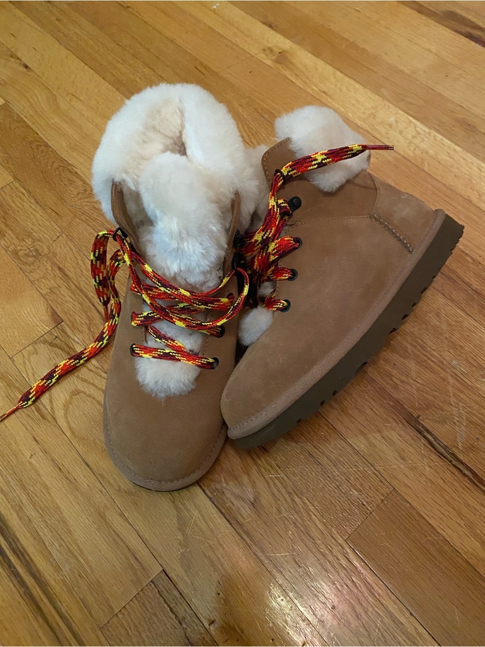 Women’s tan Mini Alpine lace up boot fleece lines